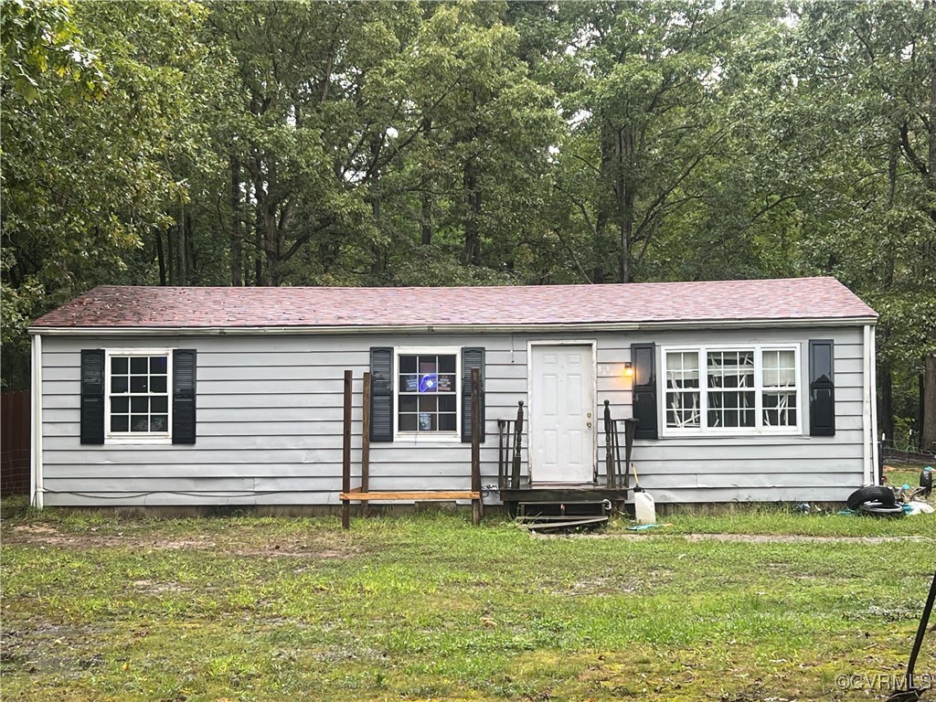 front view of a house with a yard