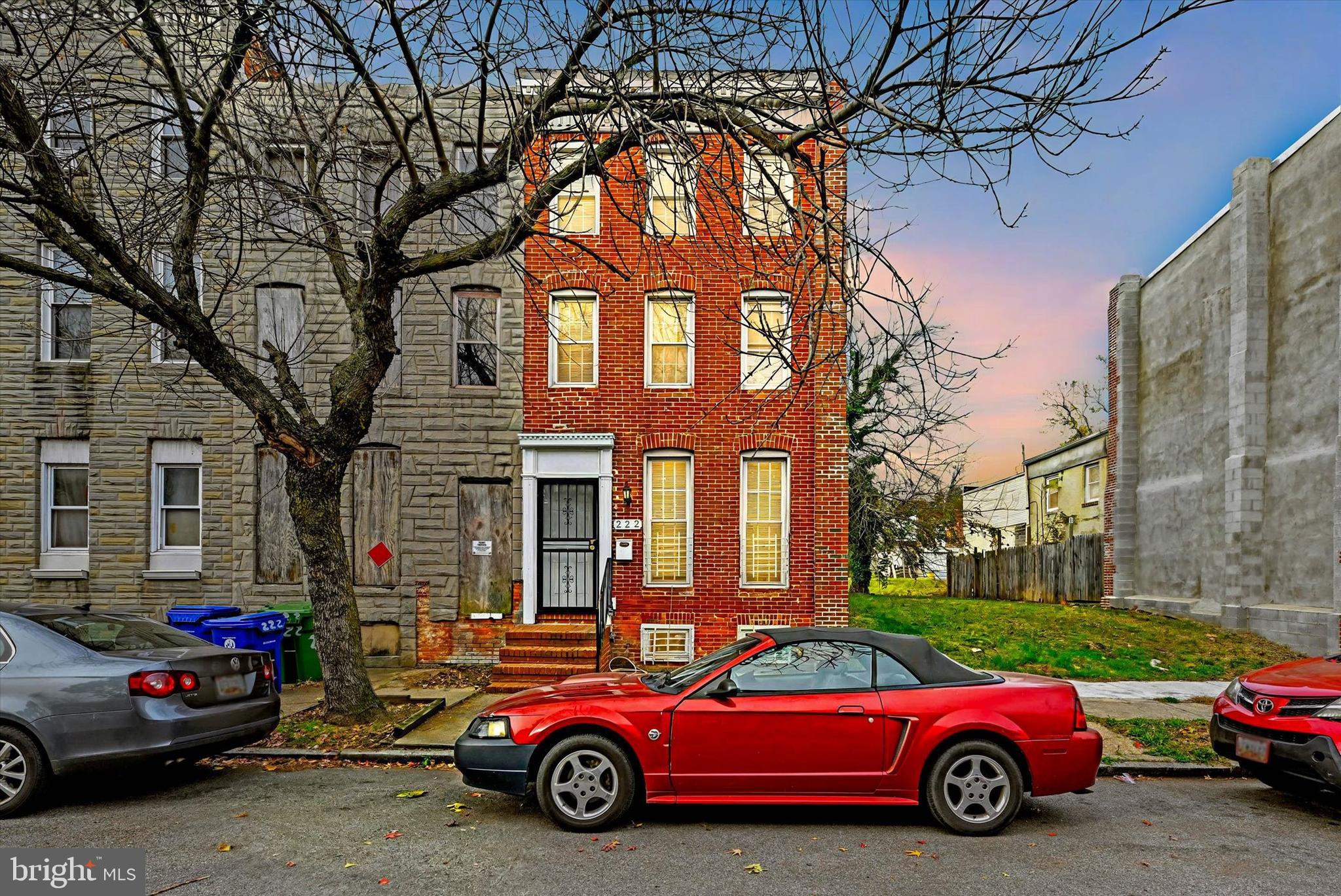 a car parked in front of a house