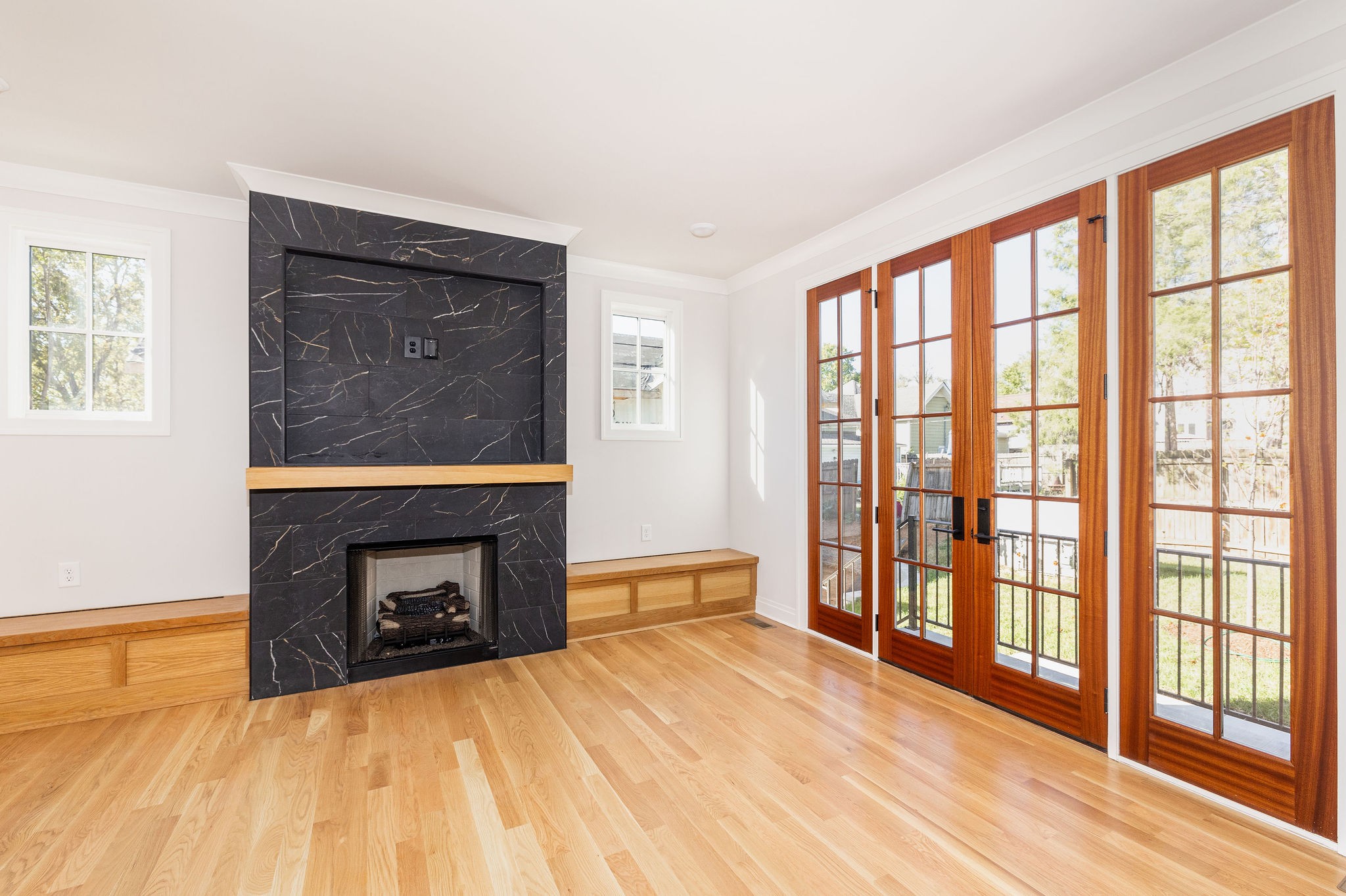 a bedroom with a bed and a fireplace