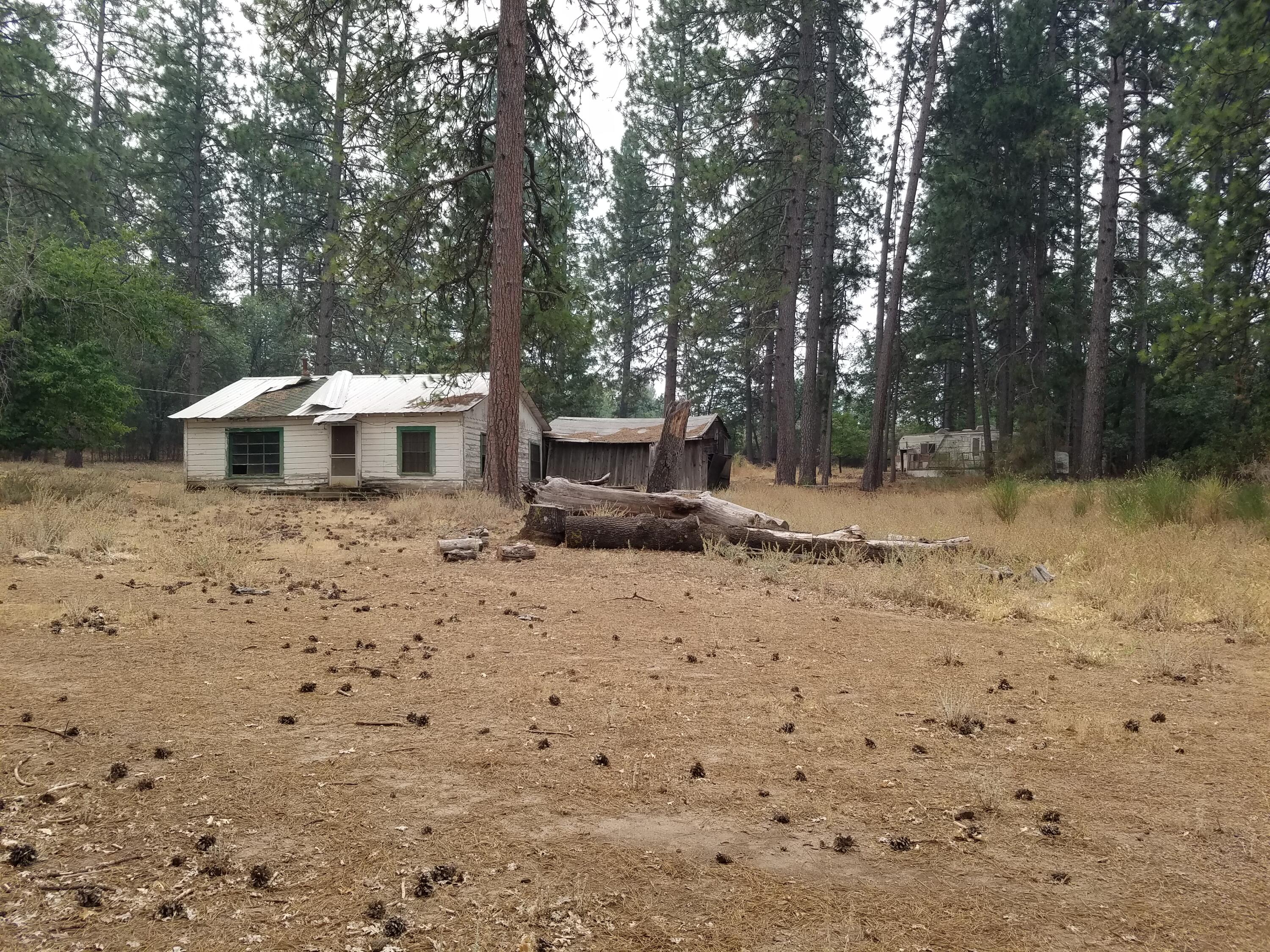 a fire hydrant in the middle of a field