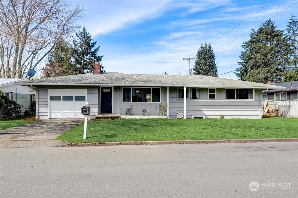 front view of a house with a patio