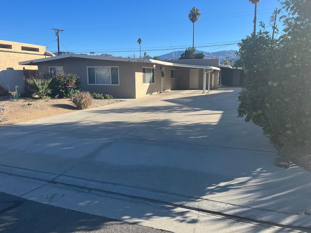 a view of a house with a patio