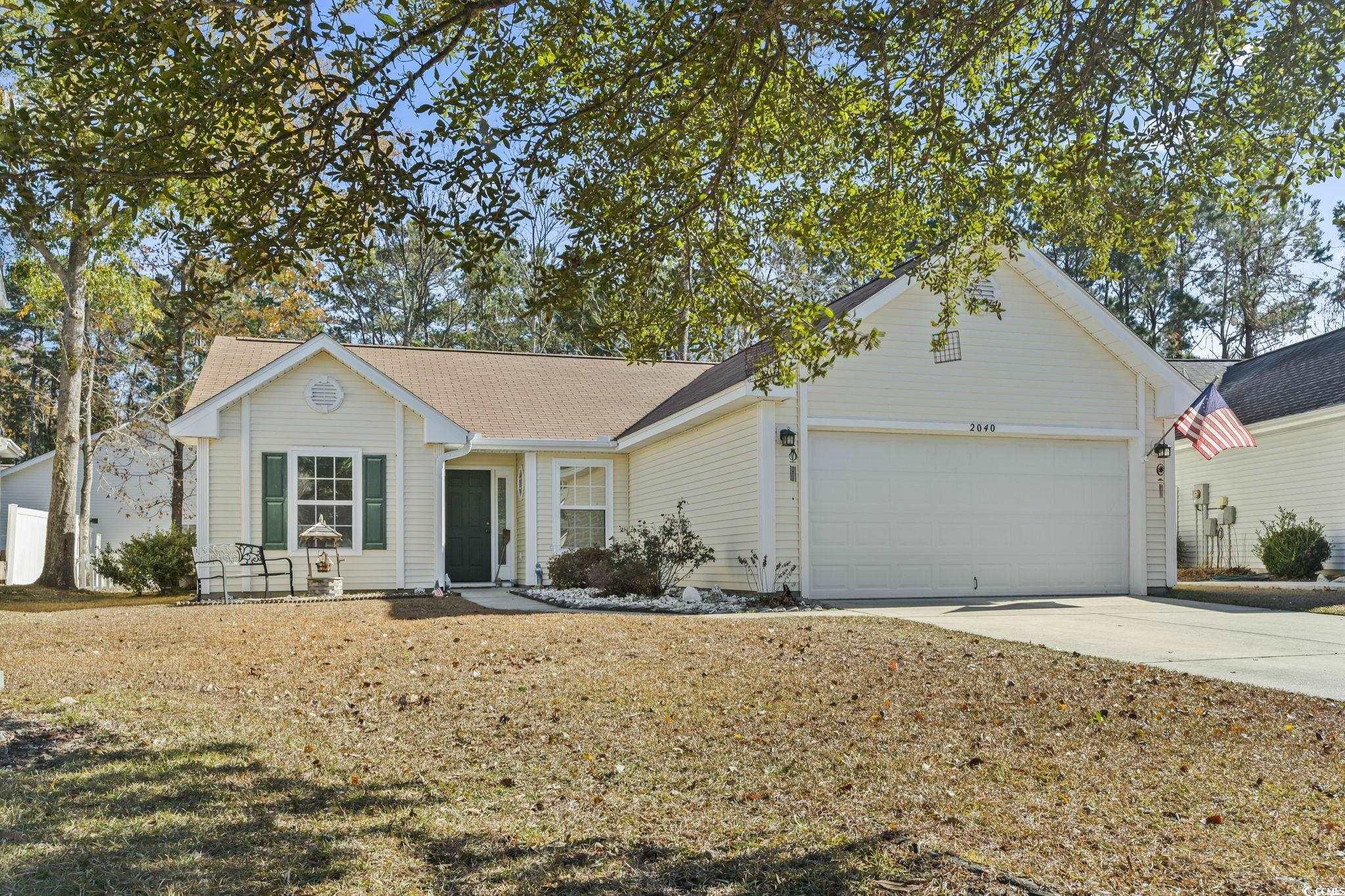 Ranch-style house with a garage