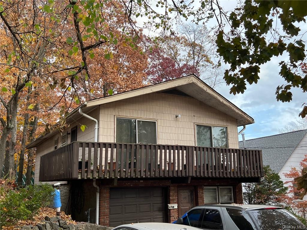 a view of a house with a roof deck