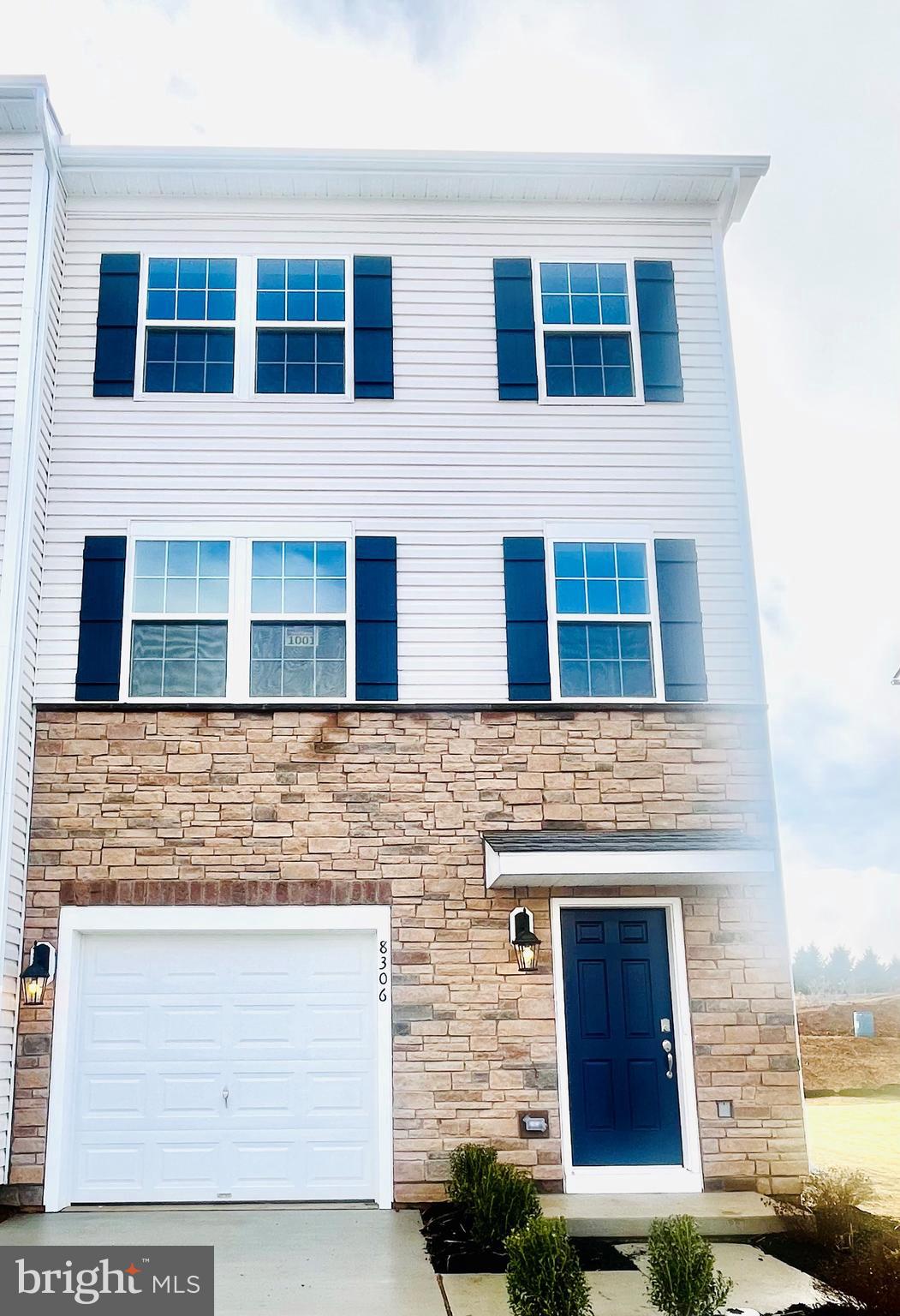 a front view of a house with windows