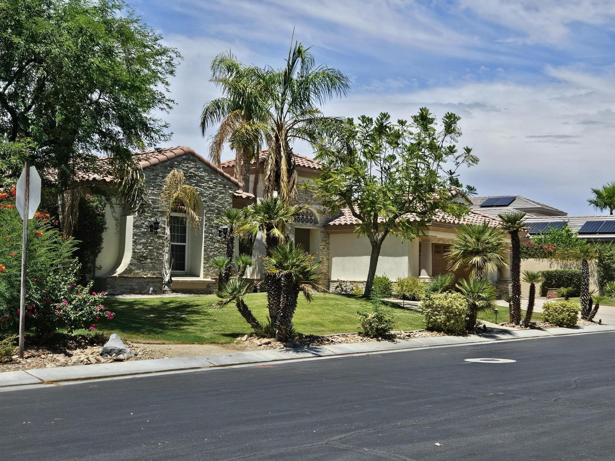 front view of a house with a street