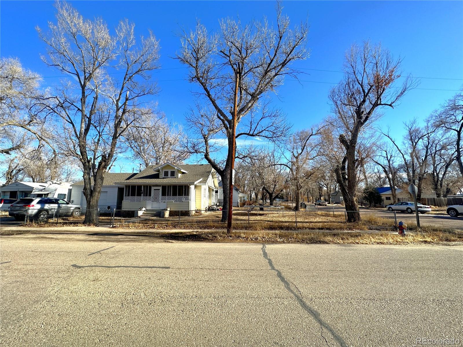 a view of a building with trees