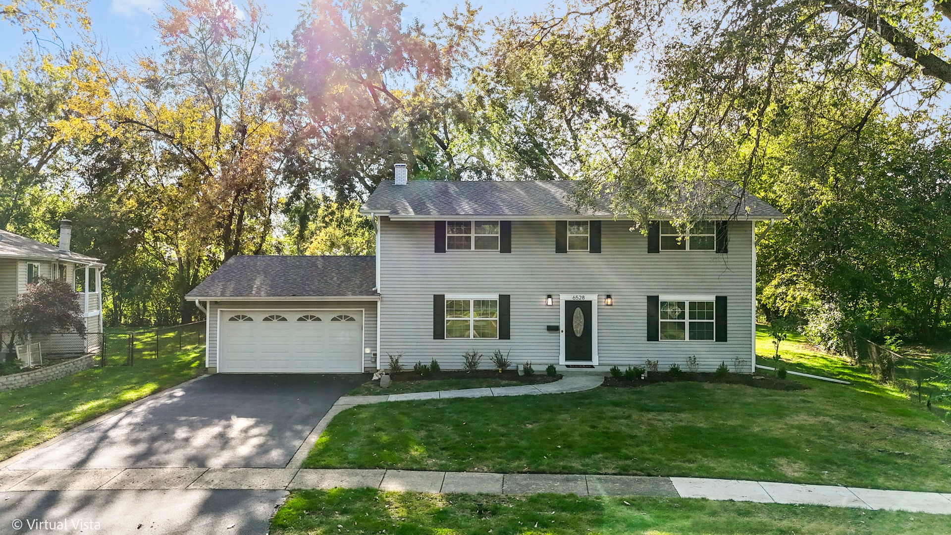 front view of house with a yard