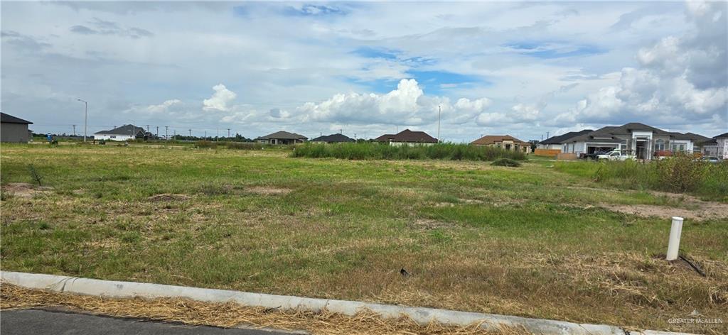 a view of a lake with a big yard