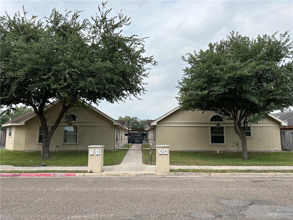 View of front of property featuring a front lawn