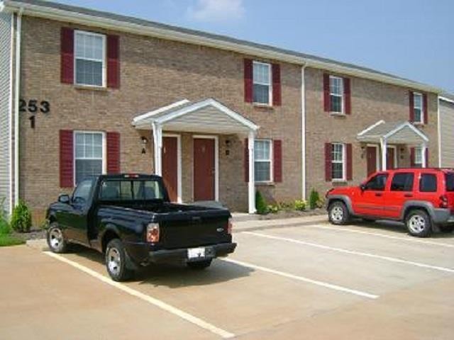 a car parked in front of a house