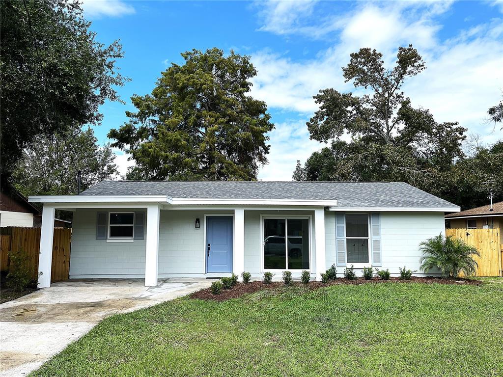 front view of a house with a yard