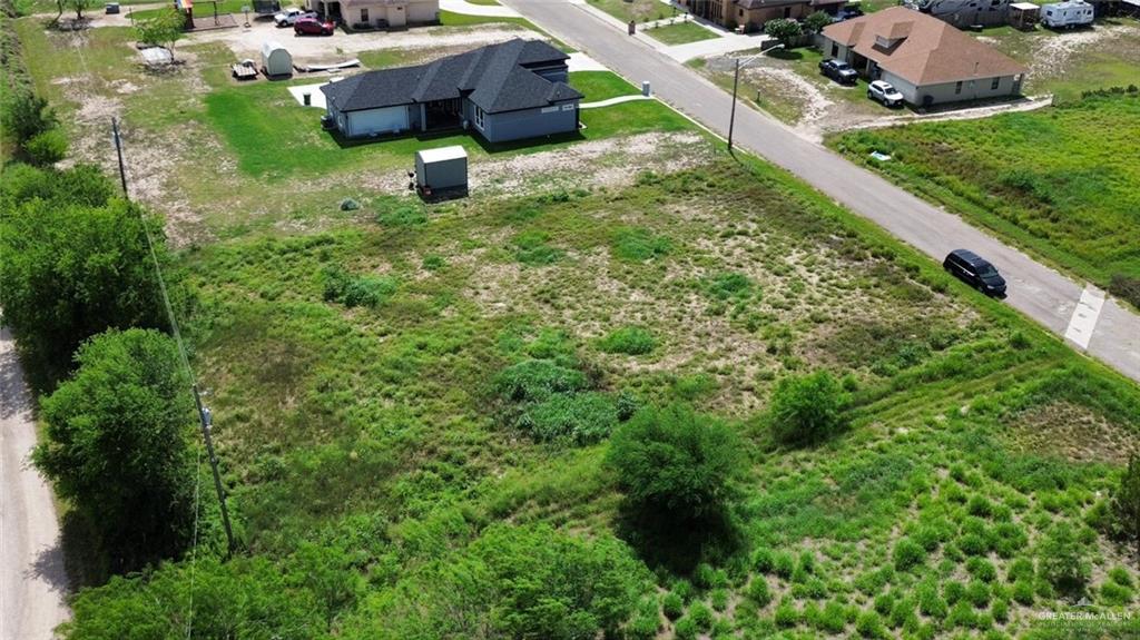 an aerial view of a house with garden