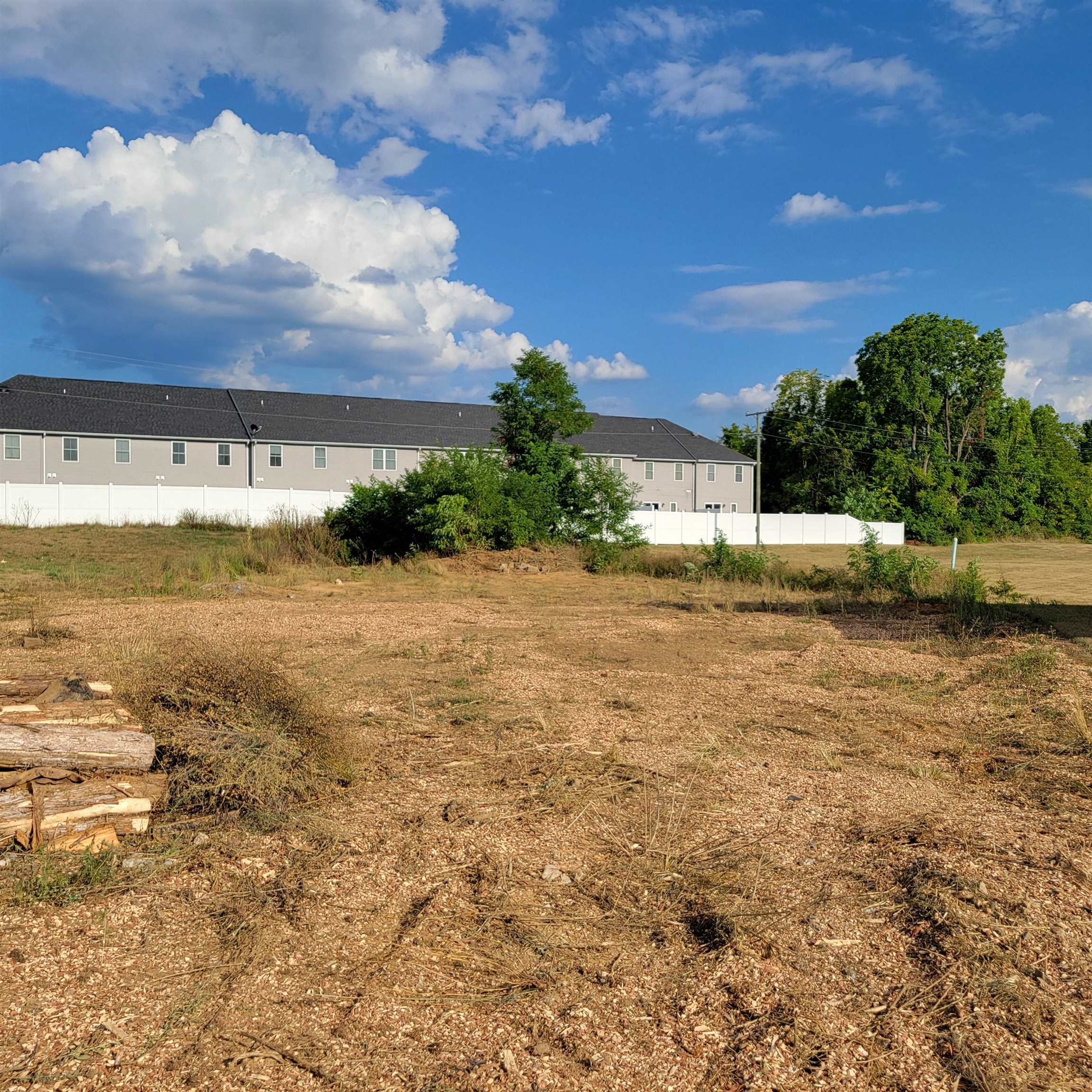 a view of a big yard with a house