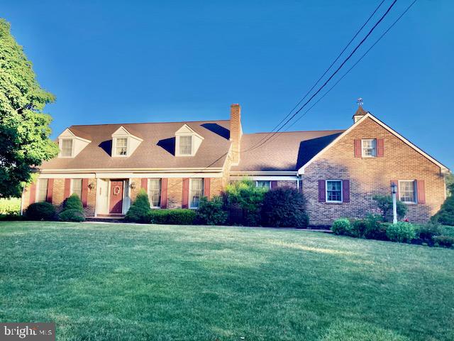 front view of house with a yard