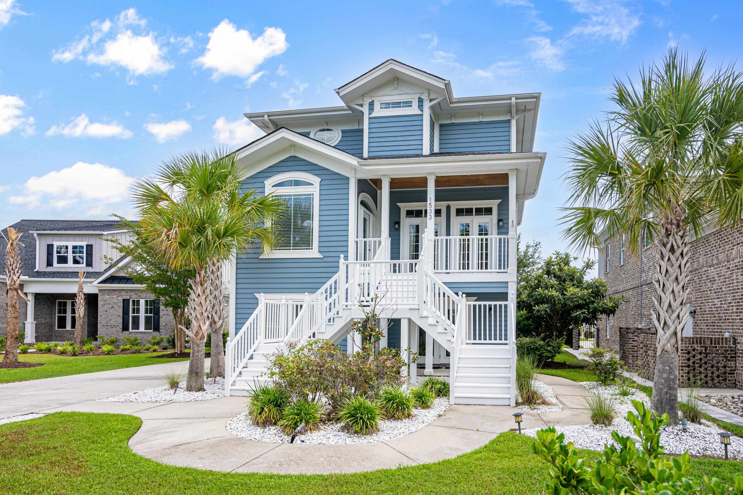 Coastal inspired home featuring a porch