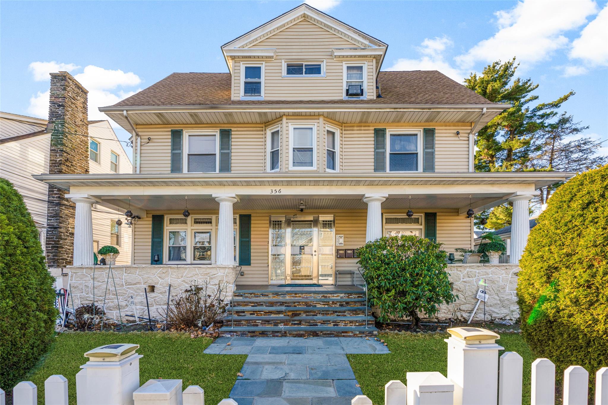 View of front of property with a porch