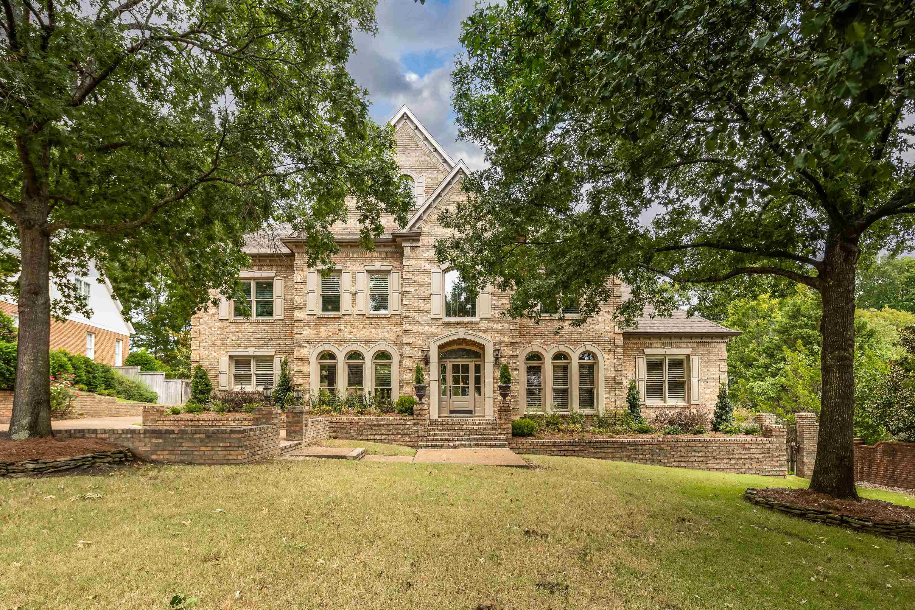 front view of a house with swimming pool