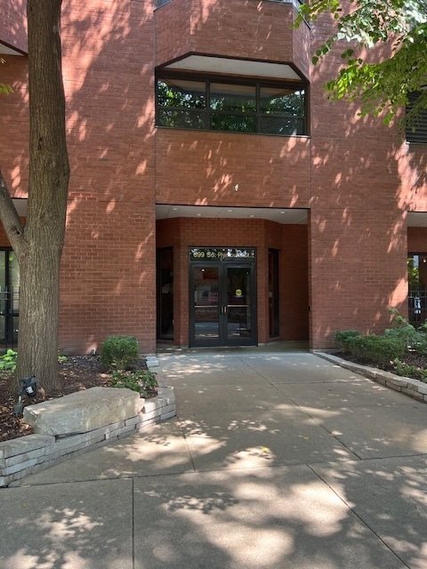 a front view of a house with yard