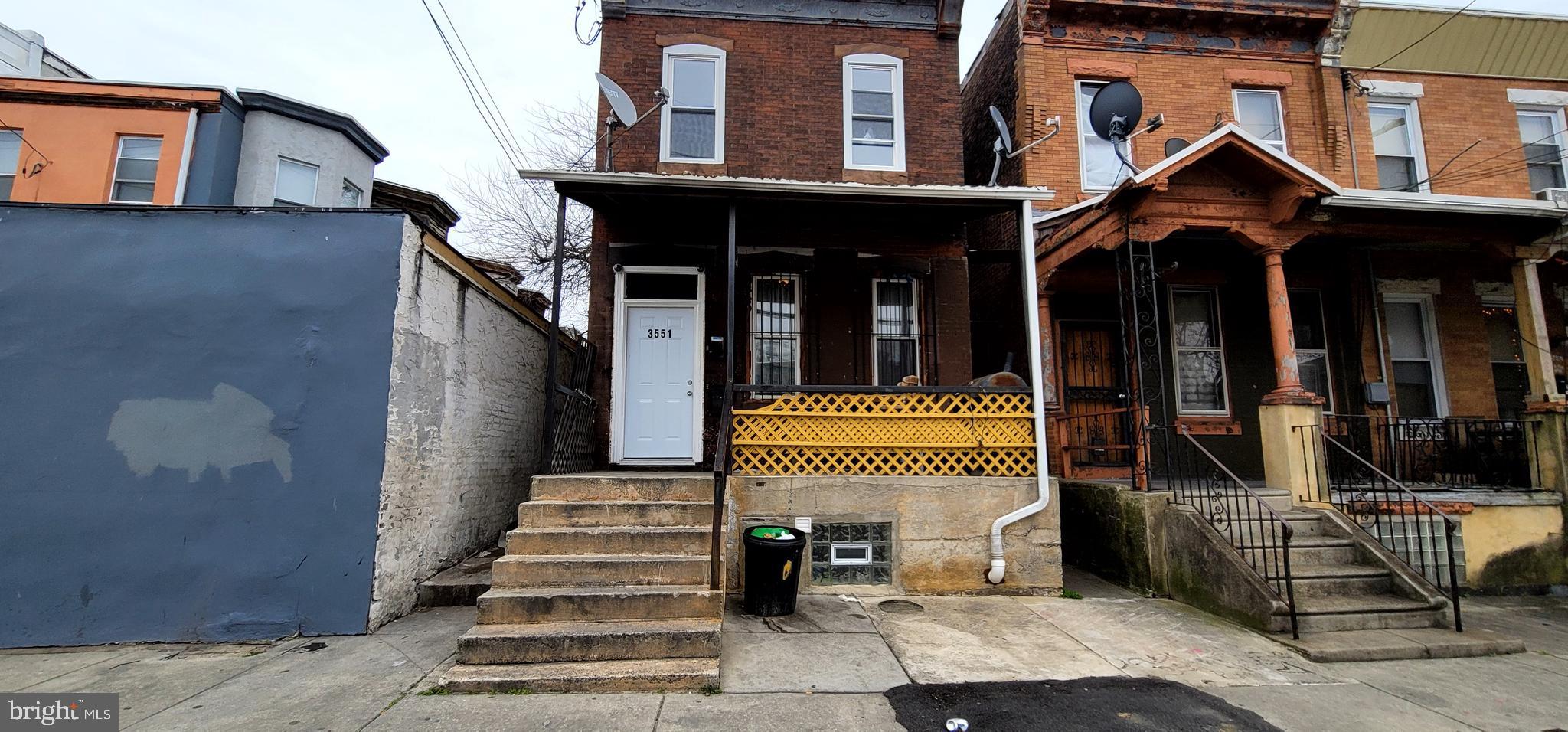 a front view of a house with a porch