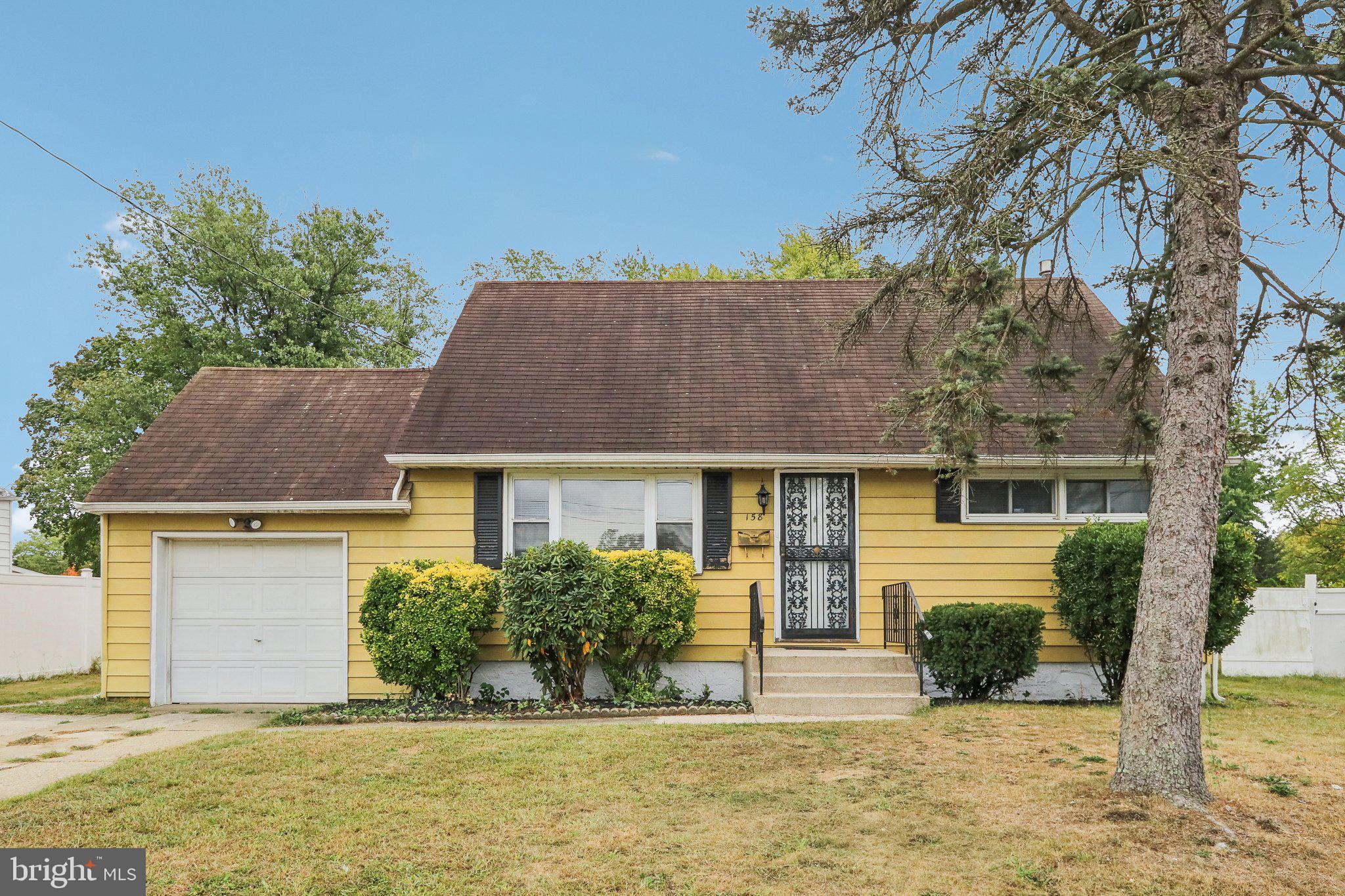 front view of house with a yard