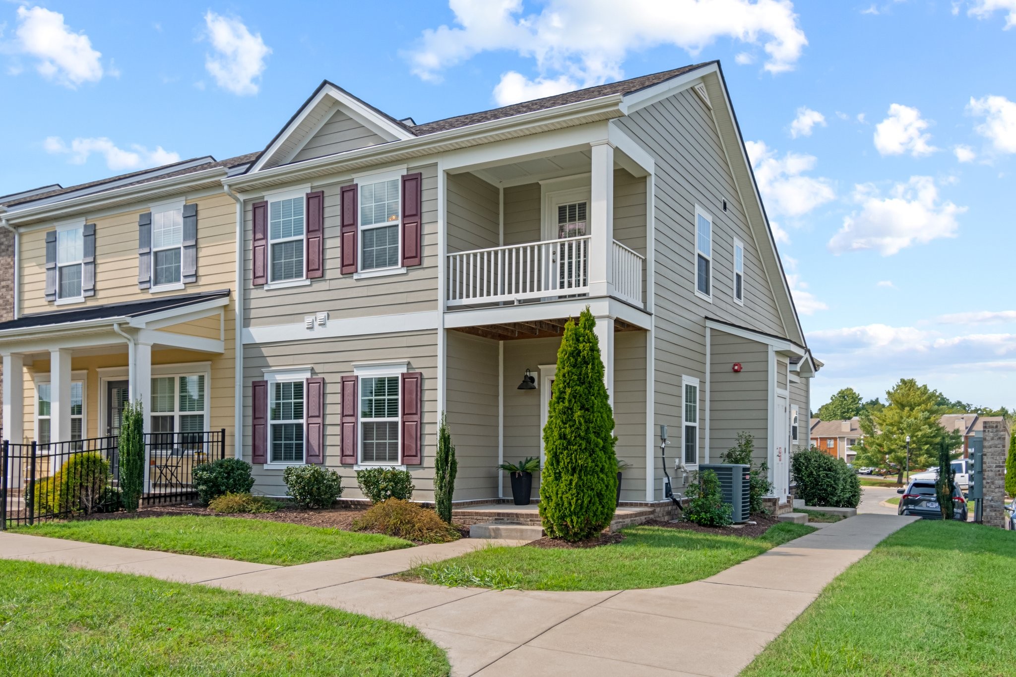 a front view of a house with a yard