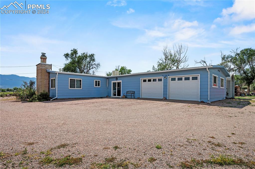 View of home highlighting attached garage