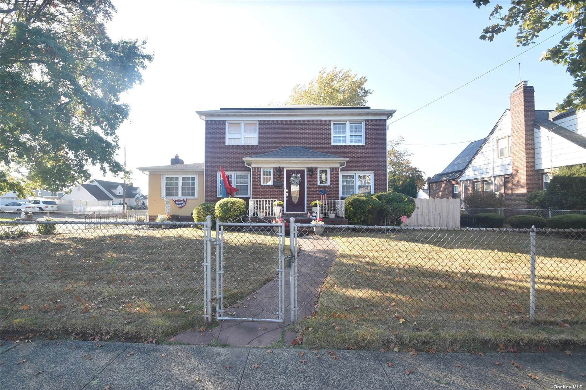 a front view of a house with street