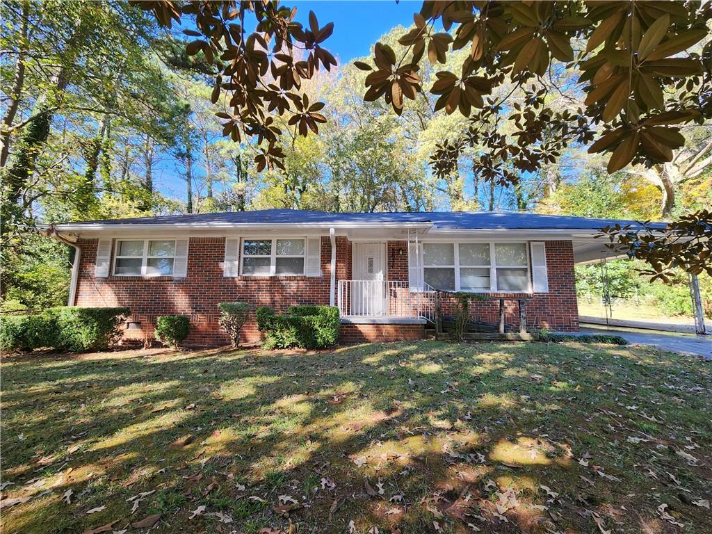 front view of a house with a yard