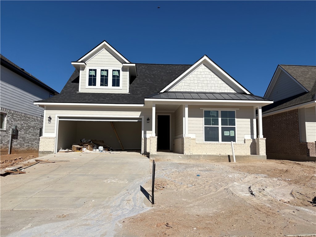 a front view of a house with yard