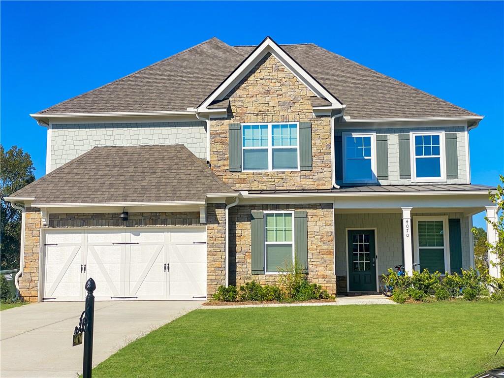 front view of a house with a yard