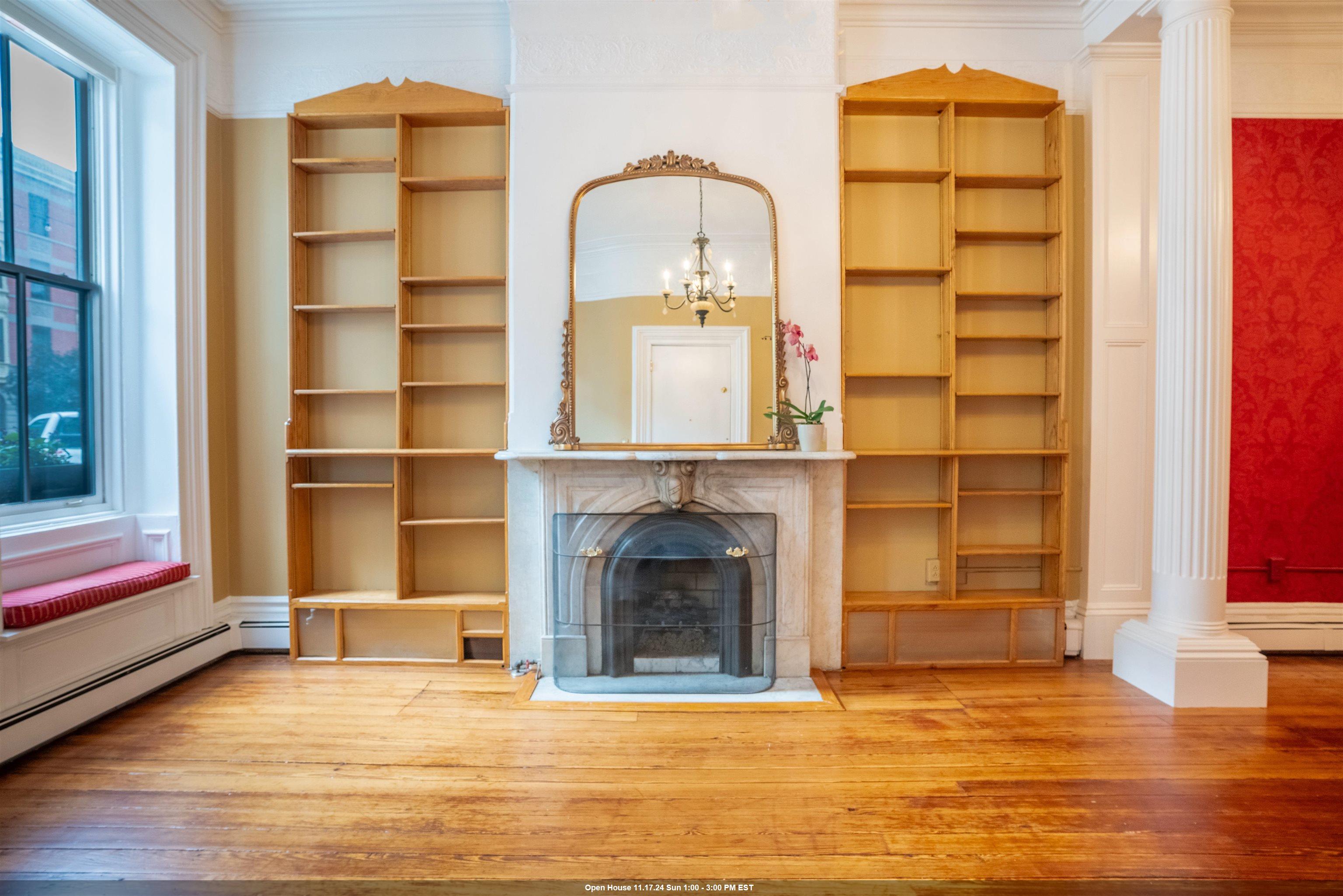 a view of a fireplace in a room with a fireplace