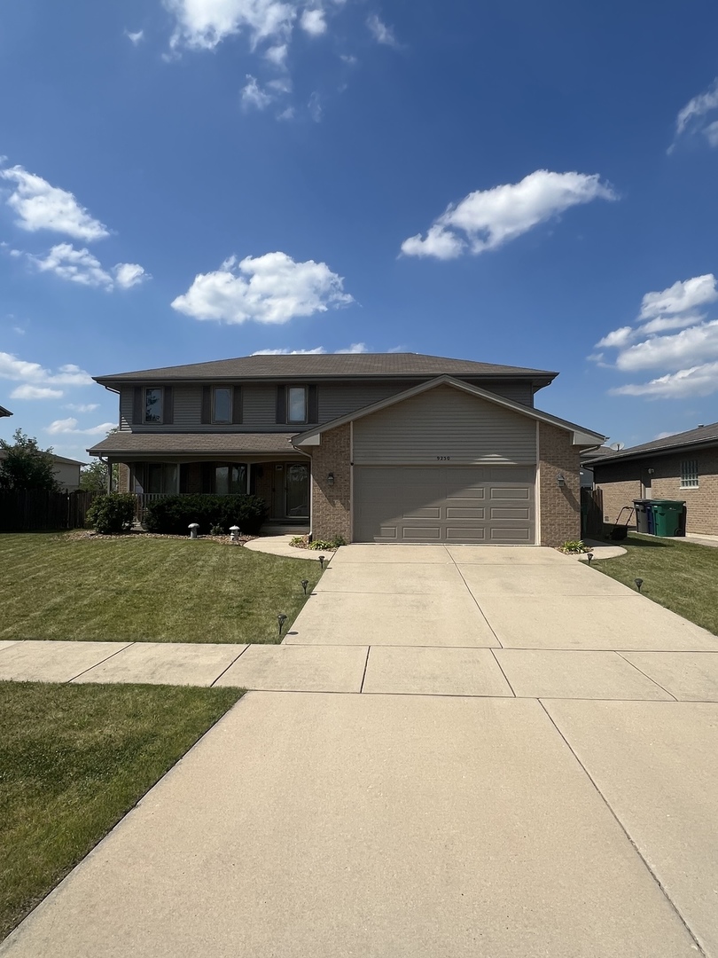 a front view of house with yard