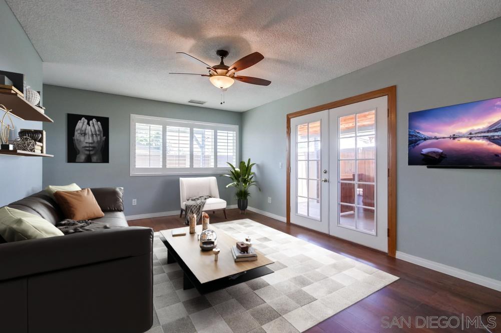 a living room with furniture and window