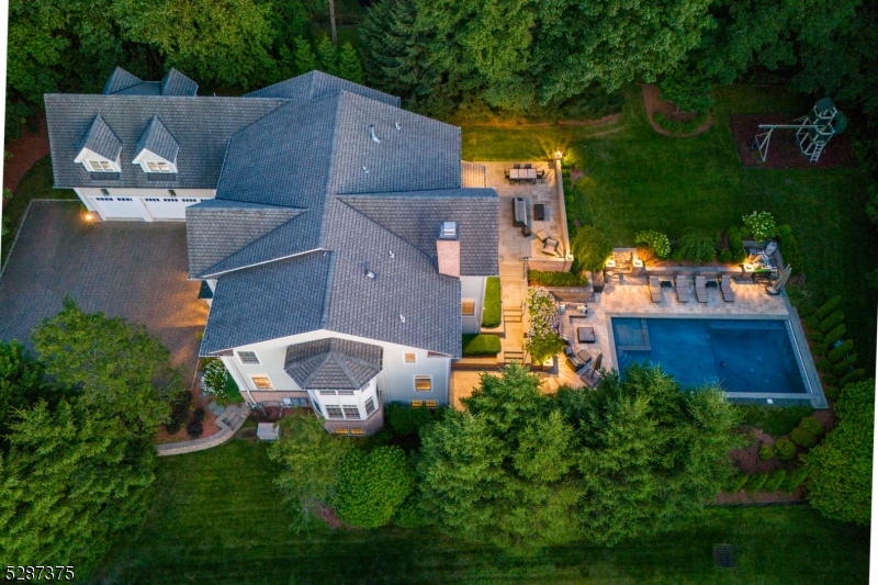 an aerial view of a house with a garden