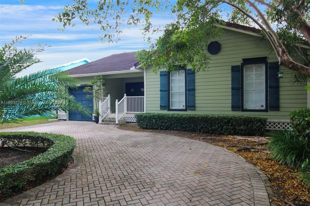 $710,000 | 16023 Southwest 97th Terrace | The Hammocks