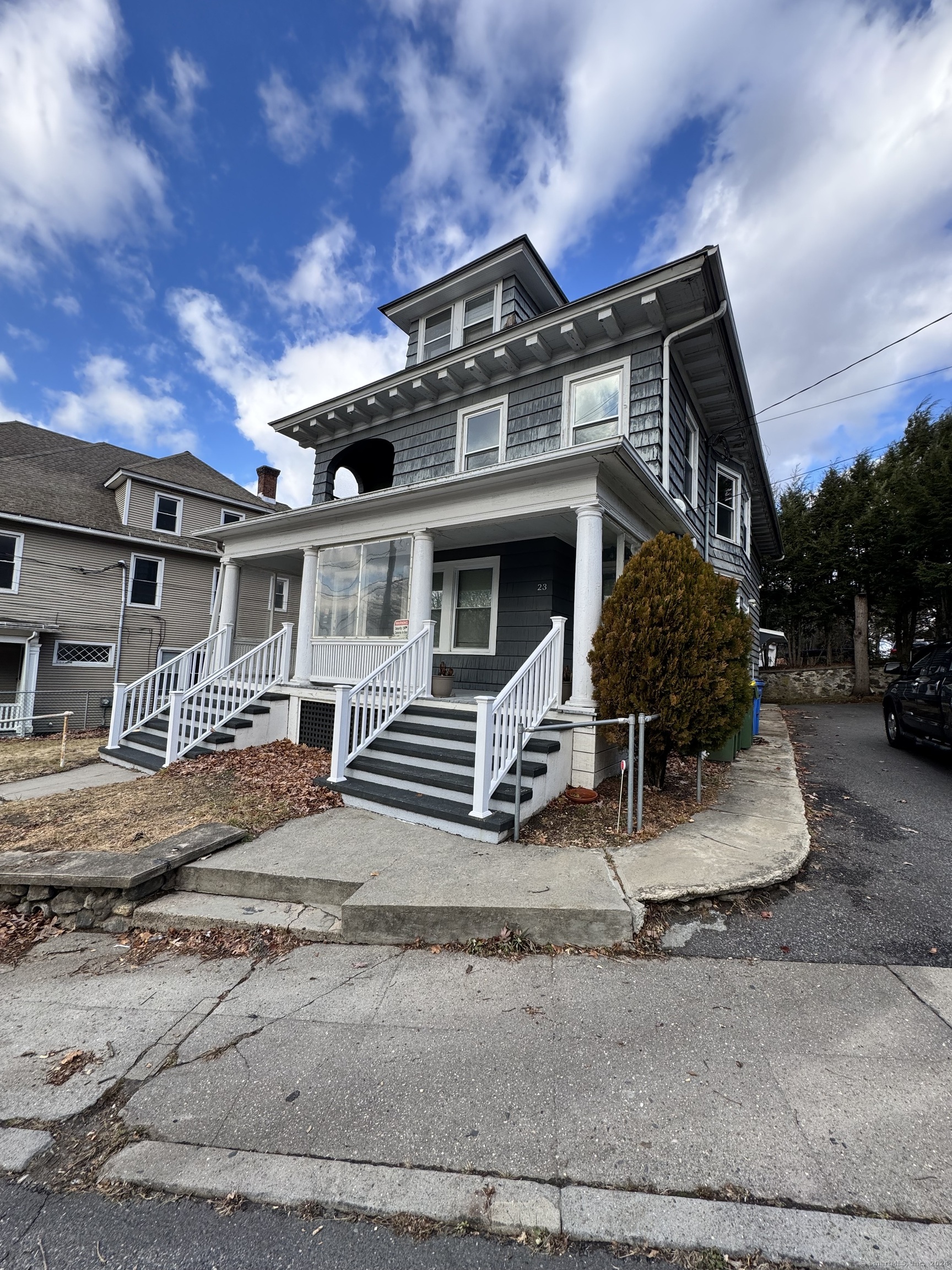 front view of a house with a yard