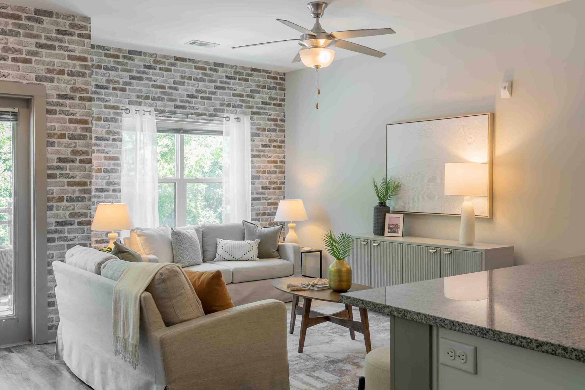 a living room with furniture and a window