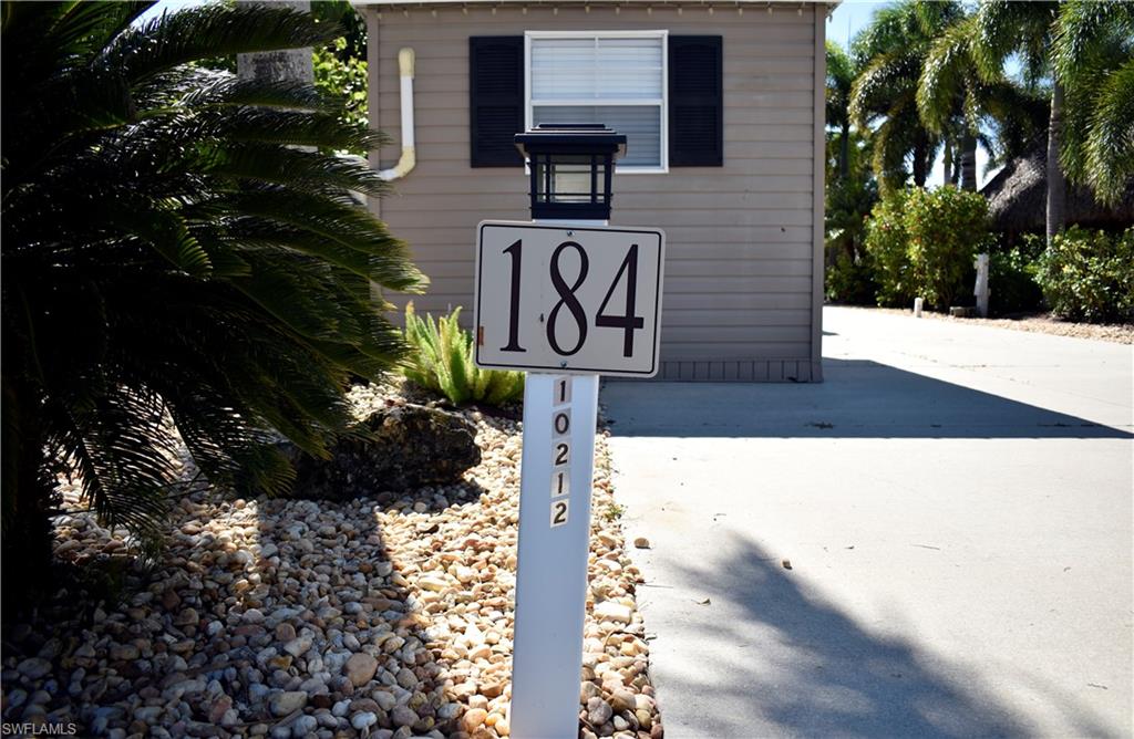 a street sign on a side of building