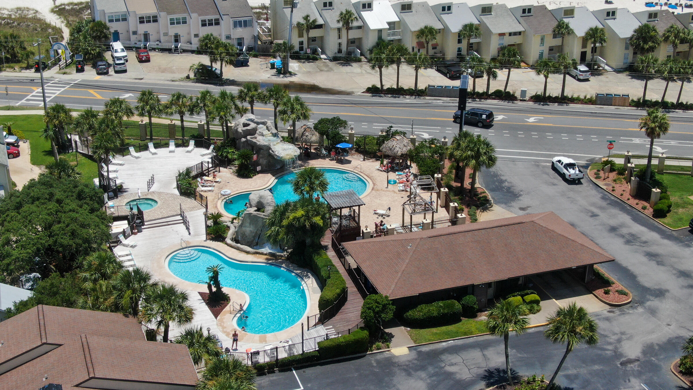 an aerial view of a house with yard swimming pool and outdoor seating