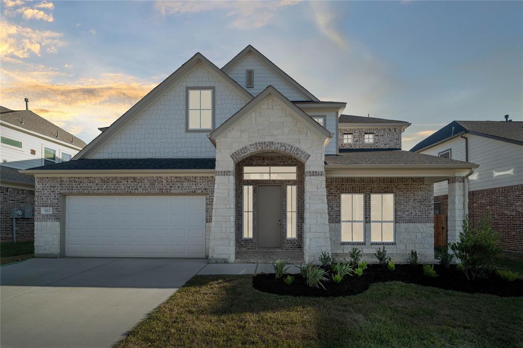 Welcome home to 3112 Red Buckeye Lane located in Barton Creek Ranch and zoned to Conroe ISD.