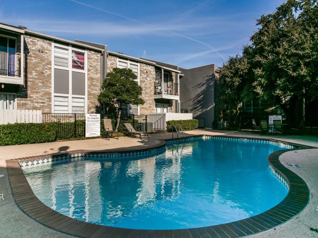 a view of a house with swimming pool