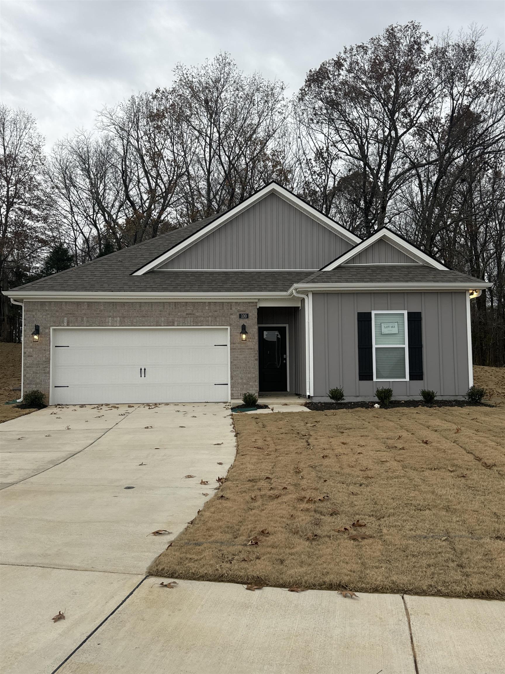 Single story home featuring a garage