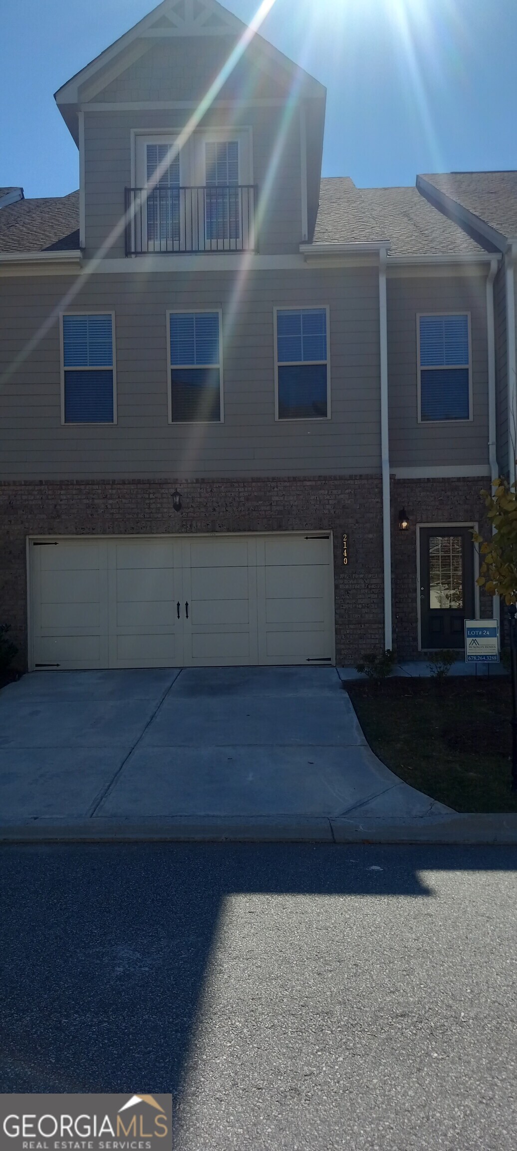 a view of house with yard