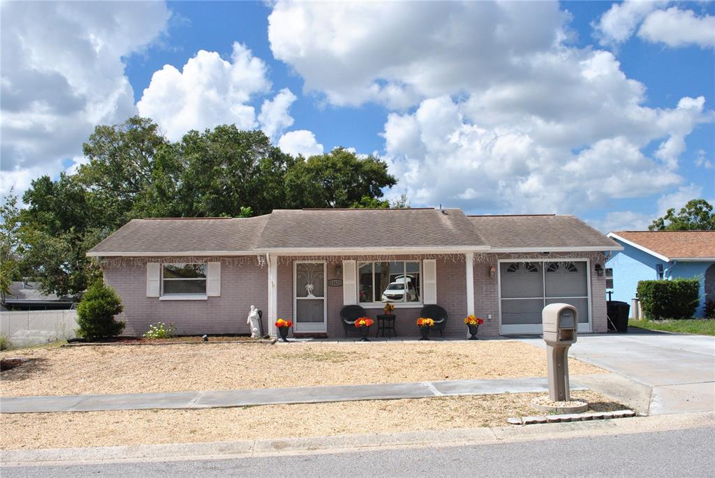 a front view of a house with a entertaining space