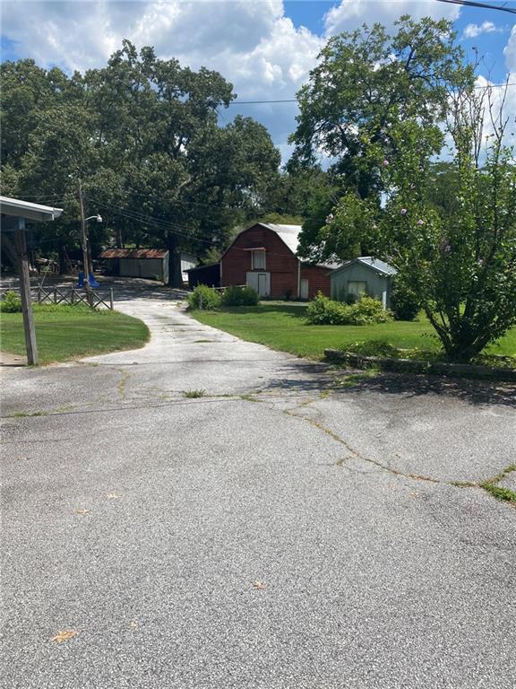 a house with trees in front of it