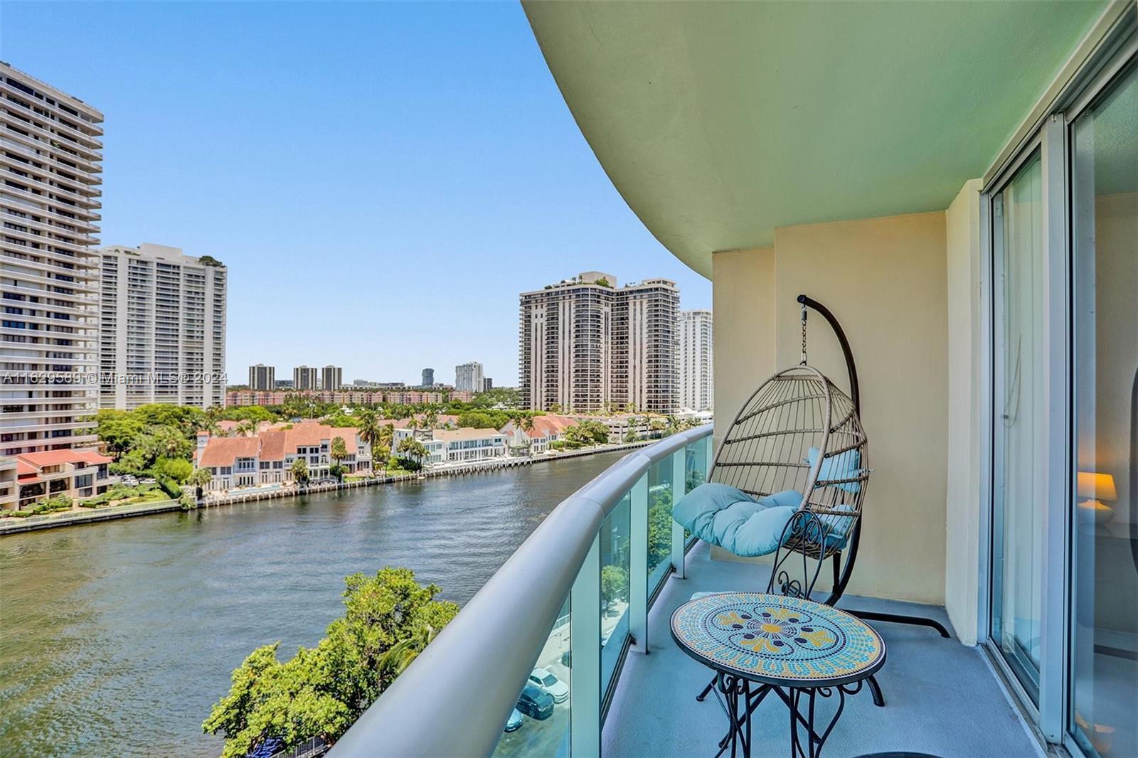 a view of a balcony with chairs