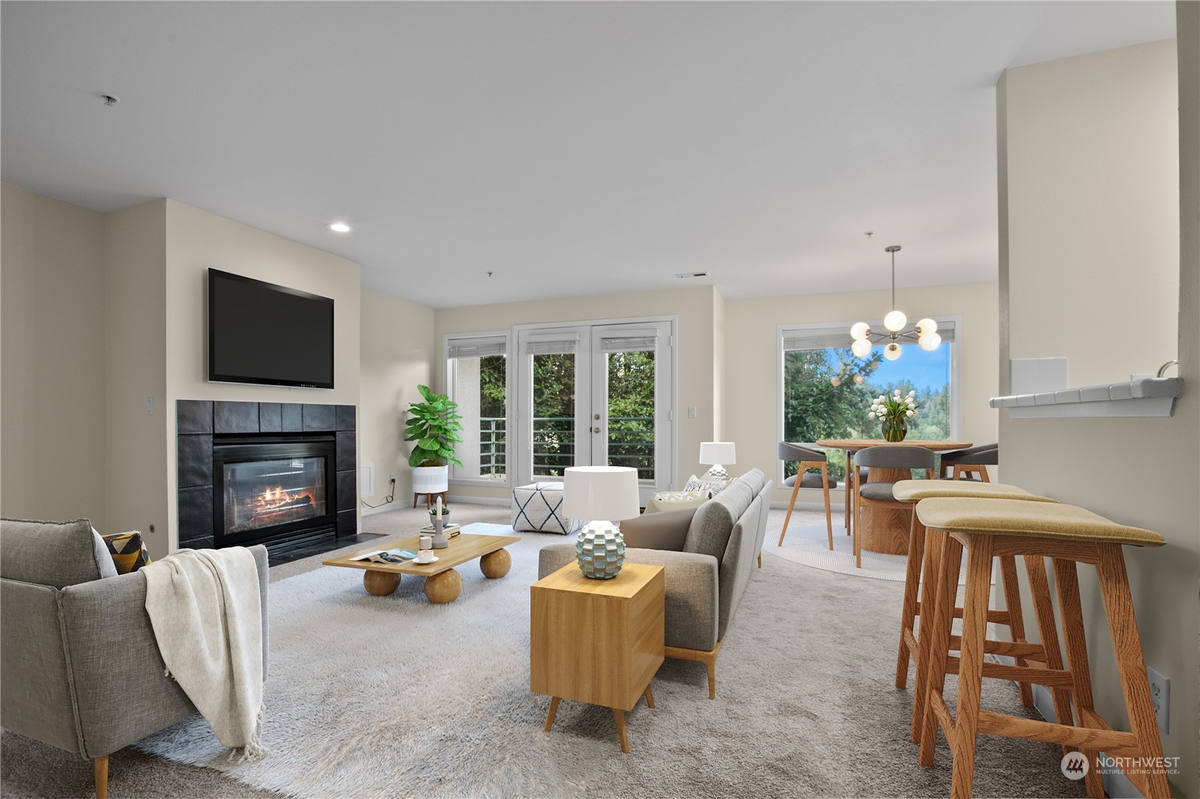 a living room with furniture a fireplace and a flat screen tv