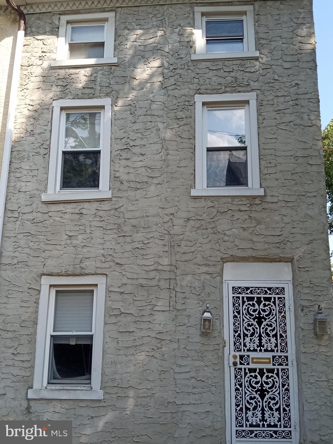 a building with a door and a window