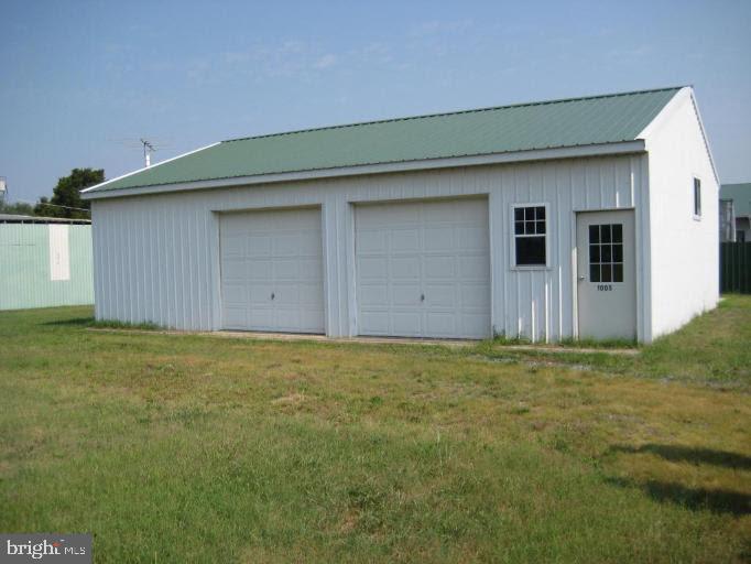 a house with yard in front of it